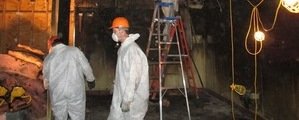 Technicians Restoring A Local Business After A Hurricane