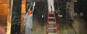 Technicians Cleaning Up Water Damaged Garage